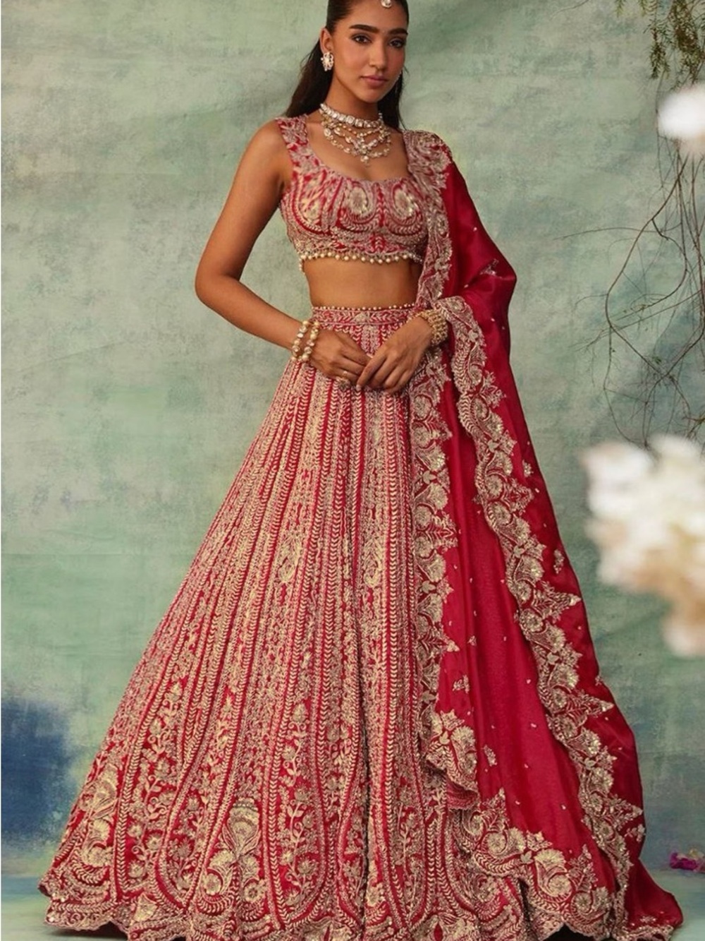 Elegant Red Bridal Lehenga with Gold Embroidery